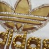 T-shirt oversize Adidas  Iconic 1963 bianca con dettagli oro, perle e strass
